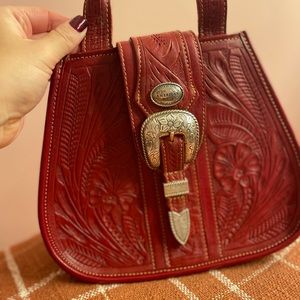 Vintage American West hand tooled leather saddle bag